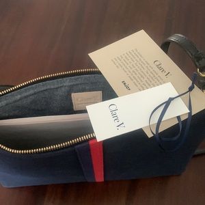 Clare NWT V. Beautiful navy suede cross body bag with red and blue stripe.